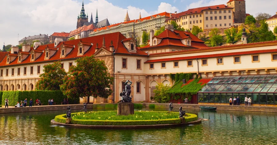 A formal Baroque garden with a pond and a loggia below the castle in the Lesser Town
